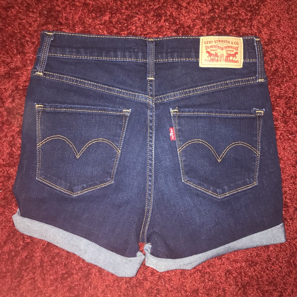 Dark wash Levi Strauss midrise cutoff shorts